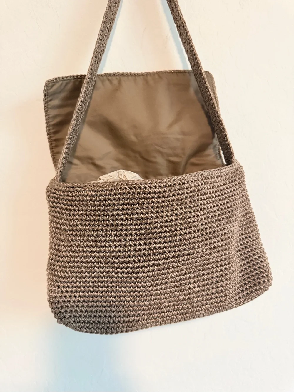 The Sak Brown Crochet Shoulder Bag with Fold-Over Flap